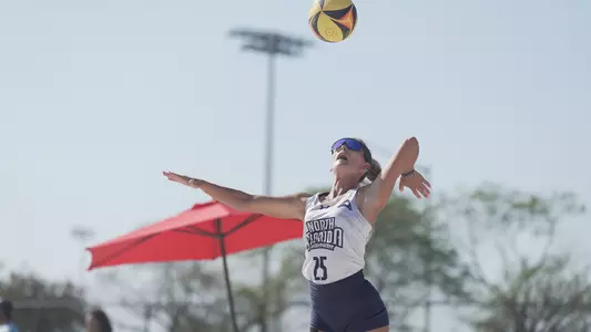 Chantel McMillan serving the ball
