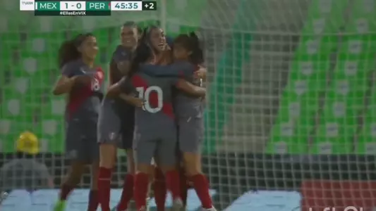 Ariana Munoz celebrating a goal during the international friendly