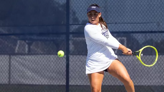 Ana Paula Melilo hitting a two-hand backhand