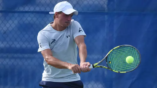 Dominik Barton hitting a forehand