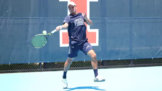 Dominik Barton hitting a forehand