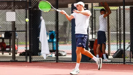 Dominik Barton hitting a forehand