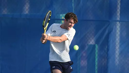 Matt Carroll hitting a forehand