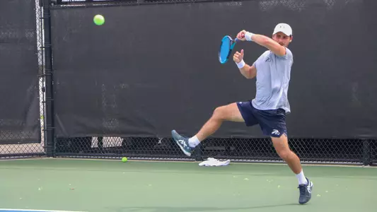 Joe Ellis hiting a forehand