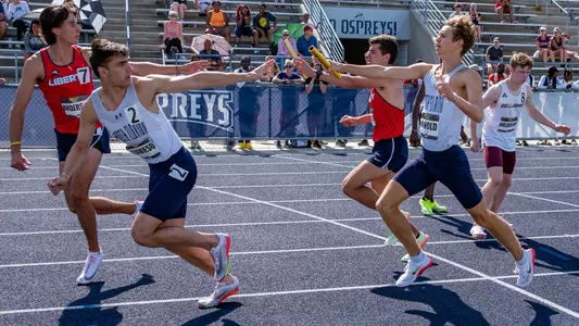 Jordan Travieso handling baton at ASUN Championship
