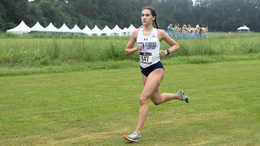 Leah Pelham focused while running at FSU Invite