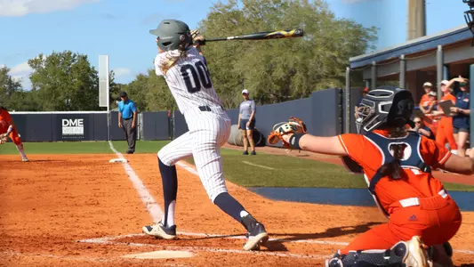 Maggie Trgo hits ball into the outfield