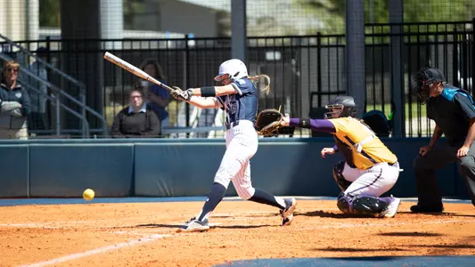Regan hermeling swings the bat at the plate