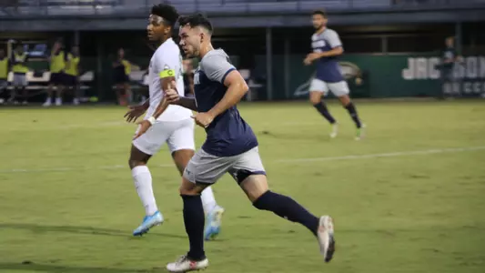 Cormac Begley running towards ball at JU