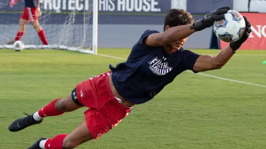 Carlos Melendez warming up at goalie