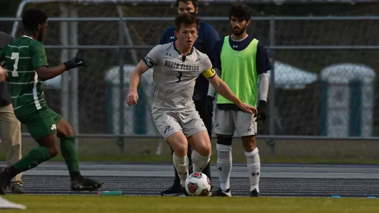 Herbie Steigelman with ball against JU