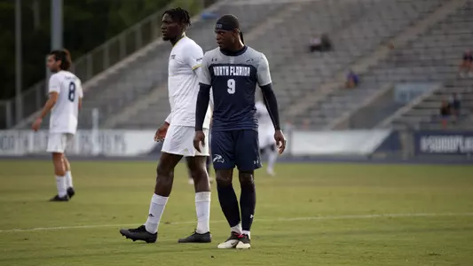 Jovoney Brown guarding defender on field