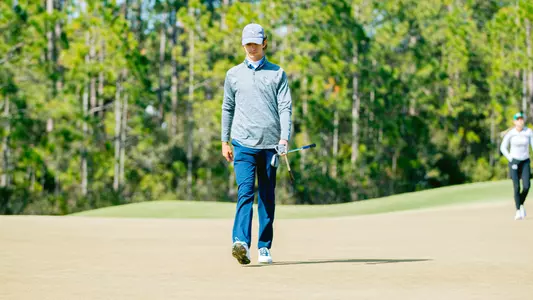 Lance Yates walks off green