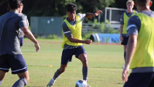 Nino Smith dribbling at practice