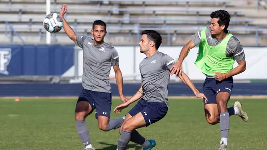 Miguel Quintana defending during warm ups