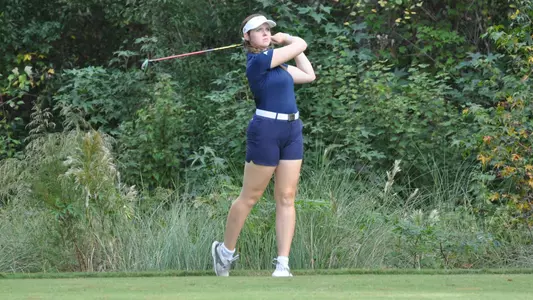 Sarah Scott hits fairway shot