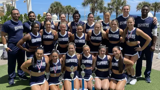 UNF cheerleading photo outside by the beach