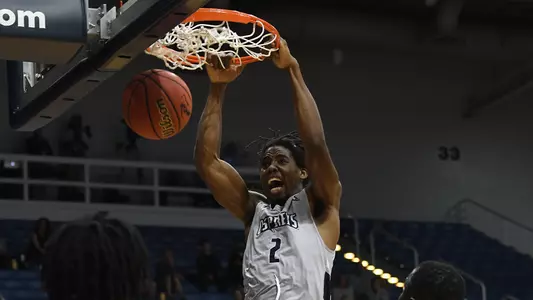 Wajid Aminu dunking the ball