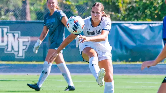 Analiese Anderson kicking the ball
