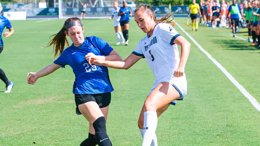 Mia Sadler fending off a challenge