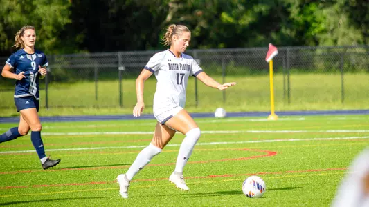 Analiese Anderson bringing the ball up the field