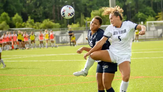 Mia Sadler battling for the ball