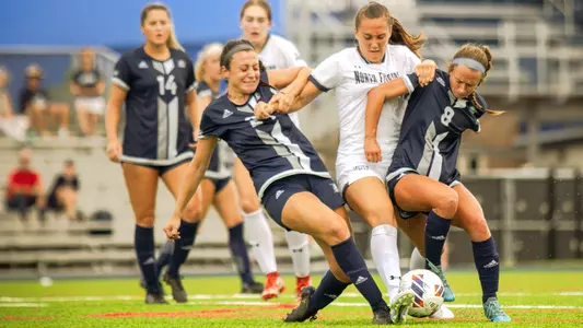 Mia Sadler fighting for the ball