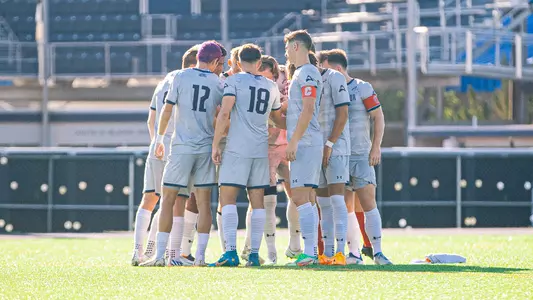 Team huddle before kickoff