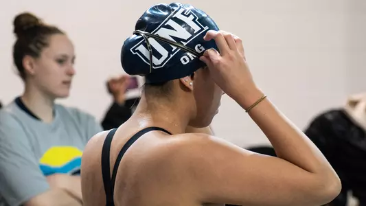 Ashley Ong adjusting her goggles