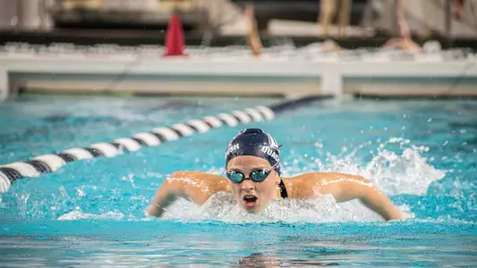 Esther Quackenbush competing in butterfly