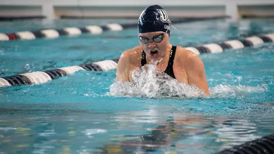 Madison Lichtig surfacing for a breath