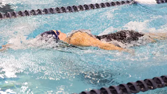 Taylor Warren competing in backstroke