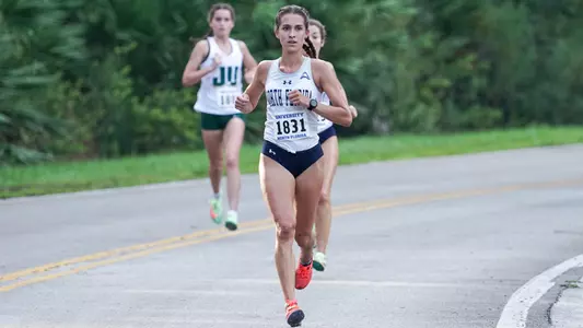 Leah Pelham running on the road in the 5k