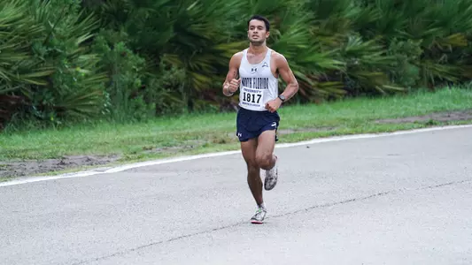 Kameron Wallizada running on the road