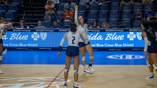 Jenna Zimmermann pointing to the sky