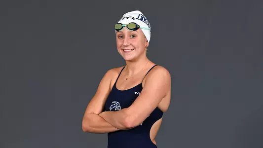 Claire Kerber with her arms crossed