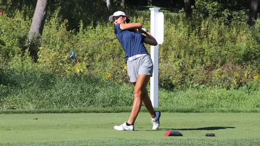 Jessie Cai hits her tee shot off the box