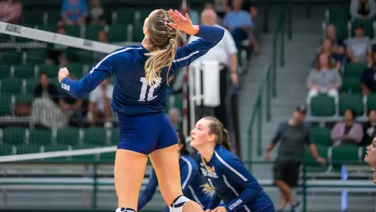 Amy Burkhardt going up to make an attack on the ball