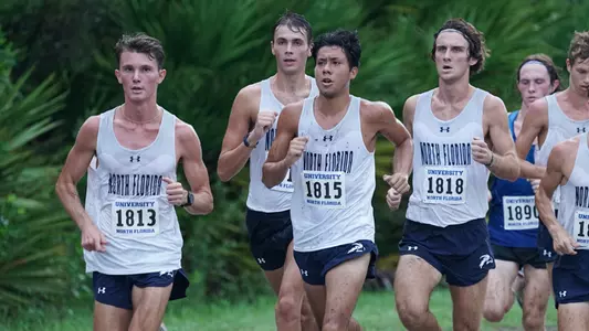Men's cross country team competing