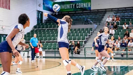 Jenna Zimmermann setting the ball