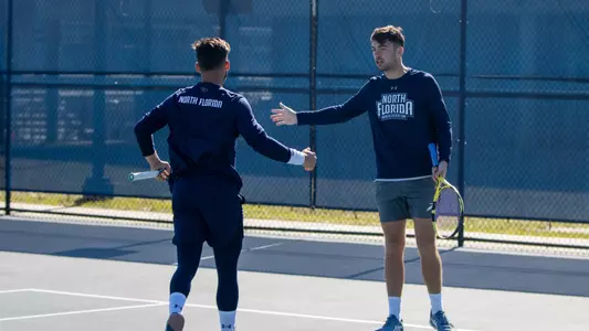 Breno Marques and Matt Carroll high fiving