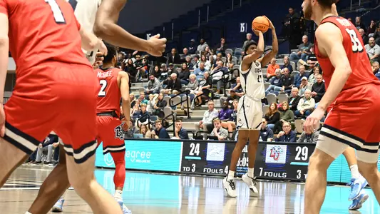 Jonathan Aybar shooting a three-point field goal attempt