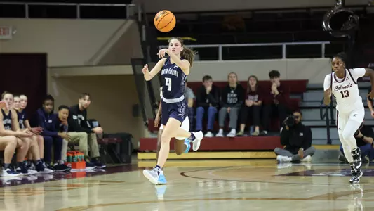 Sarah Taub passes ball against EKU
