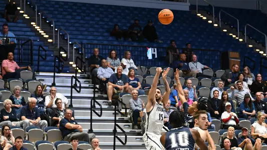 Jose Placer shooting a jump shot