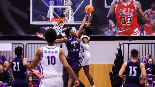 Dorian James going up for a block