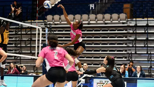 Mahalia White making an attack on the ball