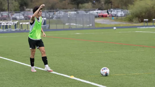 Jacob Harris lining up corner kick at practice