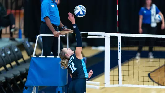 Amy Burkhardt going for an attack against New Mexico State