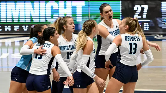 UNF volleyball team reaction during a match
