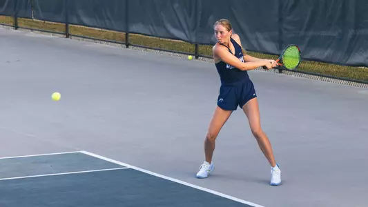 Lyshko hitting a backhand